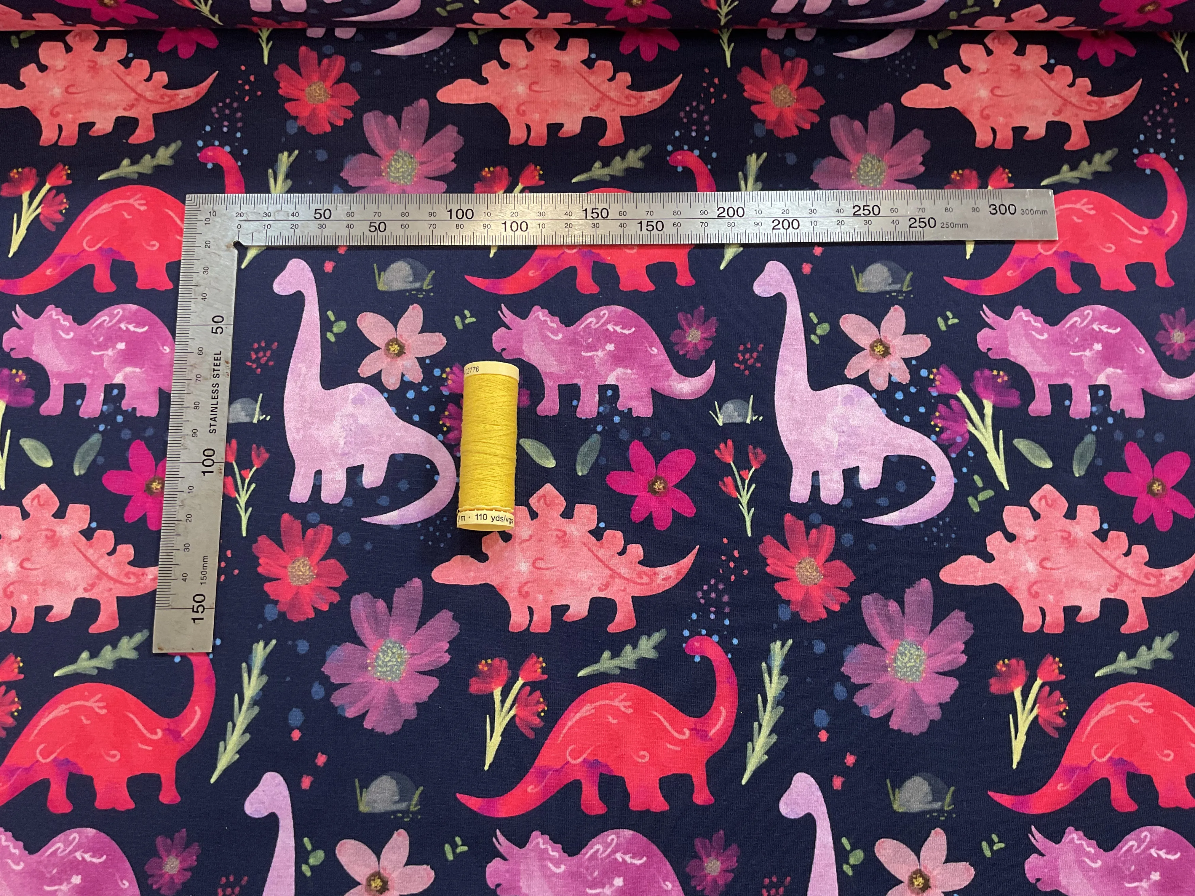 Pink Dinosaur Flowers on Navy Cotton Jersey Fabric